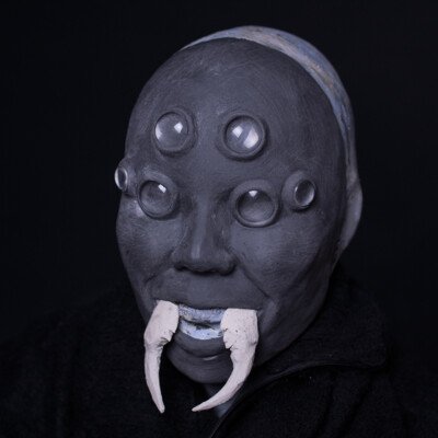 Delve into the creative journey behind Anett Alexandra Bulano's Tsuchigumo mask sculpture as it takes form, revealing the intricate details and craftsmanship behind the legendary Japanese spirit. 🕷️🎨 #SculptureInProgress #SFXArt #TsuchigumoMask Work in progress photo of a Tsuchigumo mask sculpture made from SFX clay, featuring glass eyes and spider fangs.